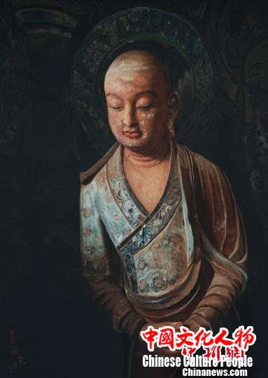 图为用中国非遗苏绣“绣”出的敦煌石窟造像。 钟欣 摄 图为用中国非遗苏绣“绣”出的敦煌石窟造像。 钟欣 摄